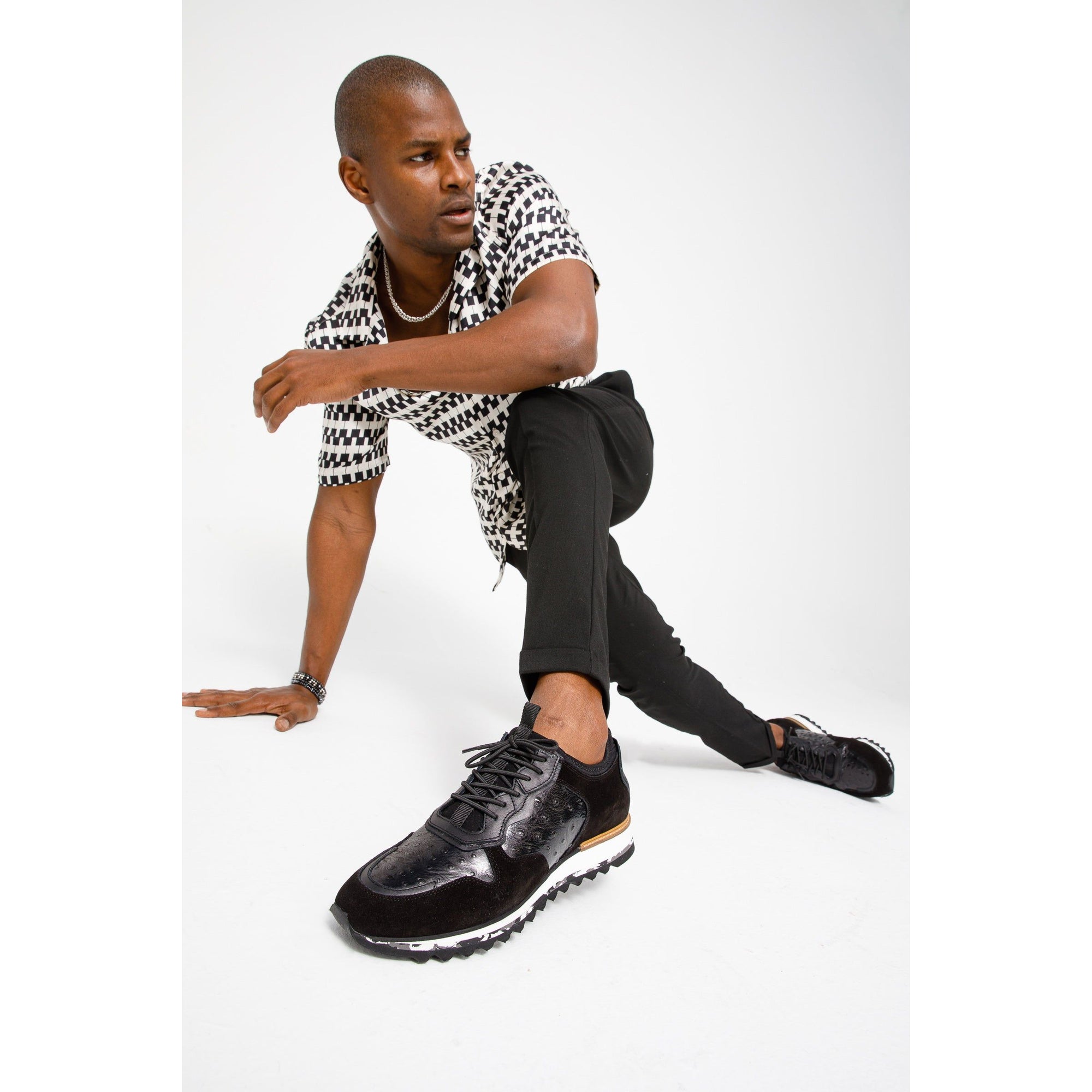The Sopez Black Leather Men Sneaker