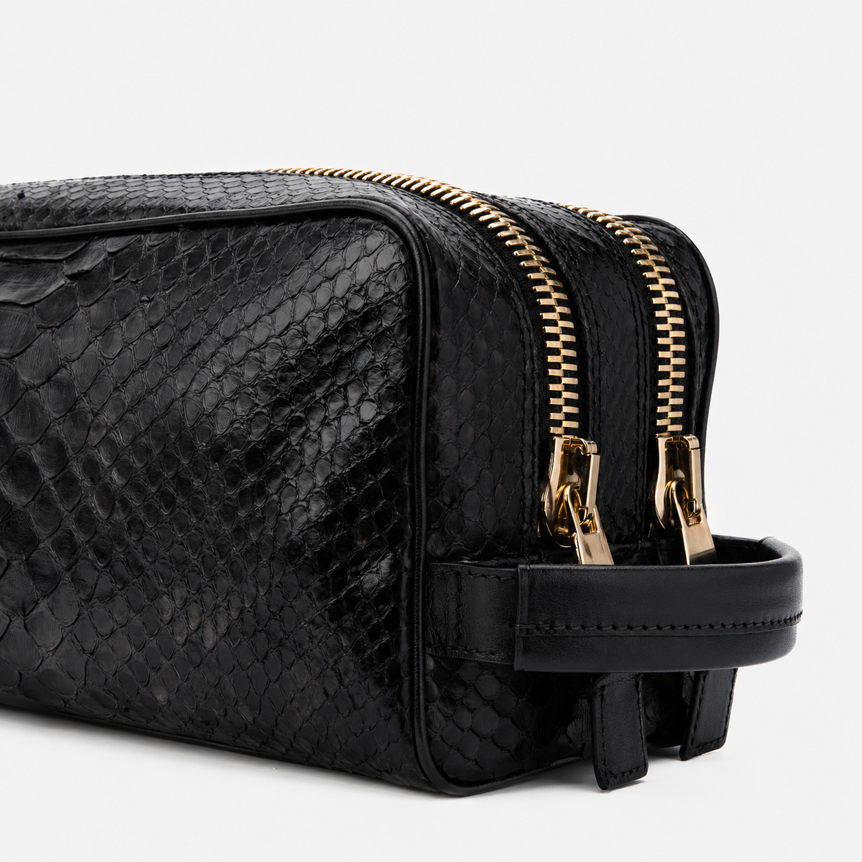 The Belluno Black Python Leather Men’s Essentials Bag